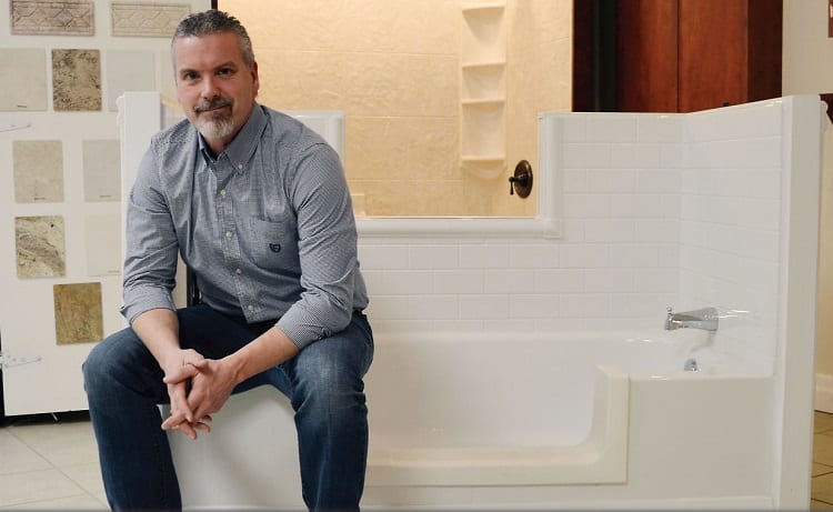 Man Sitting On Bathtub